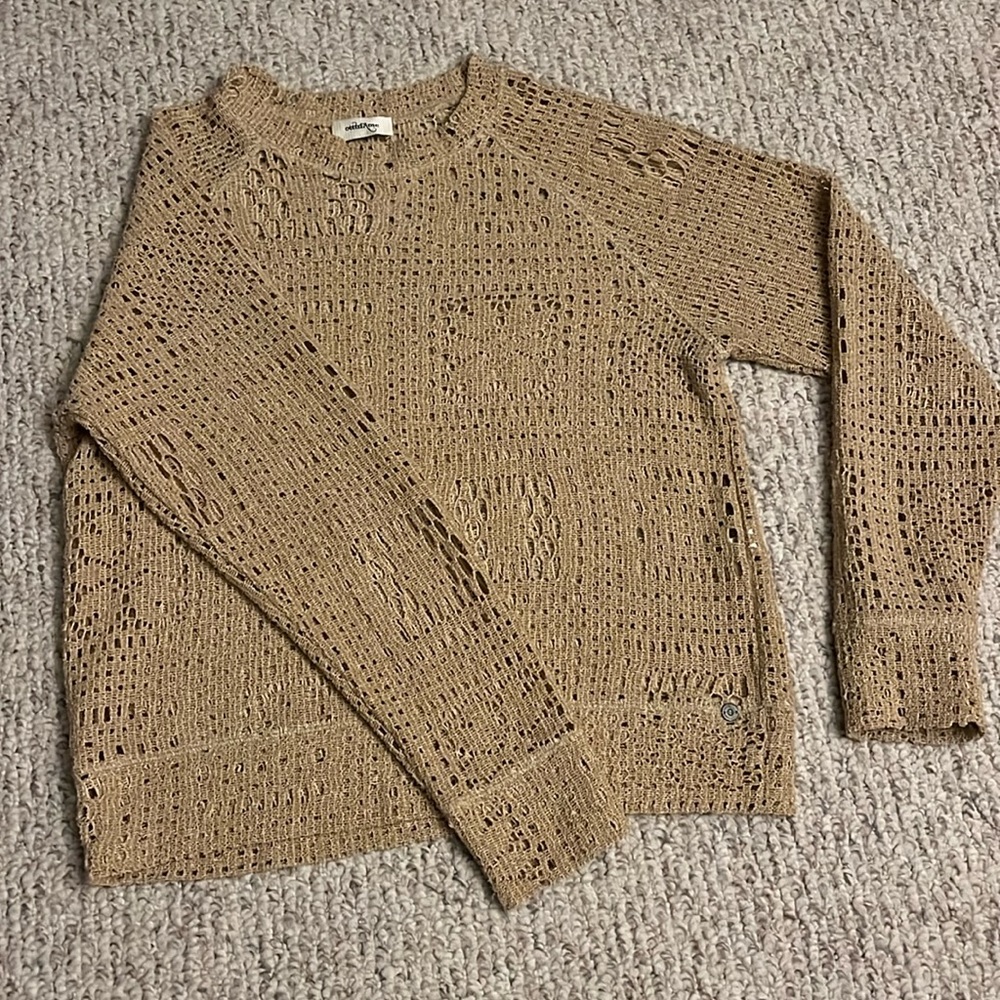 Women’s sweater.